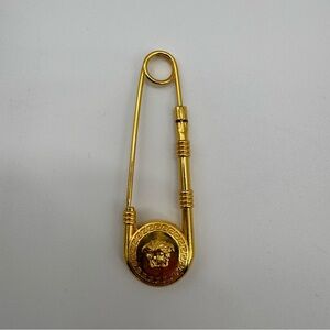 Versace Gold Safety Pin Brooch with Medallion Accent